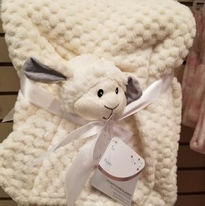 Off white blanket with lamb blanket